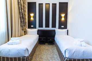 Отель Royal Petrol Hotel Талдыкорган Стандартный двухместный номер с 2 отдельными кроватями-6